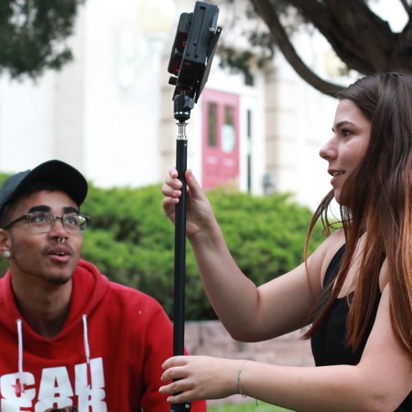Students Nathaniel Nash and Rachel Boyce get hands on experience with video equipment.