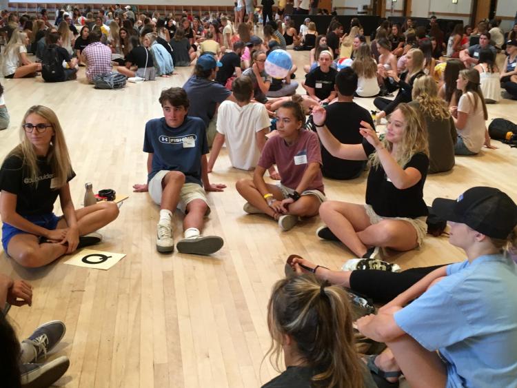 Students play a game to get to know each other.