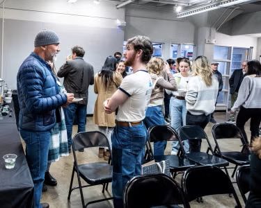 people mingling in an ENVD classroom