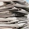 A stack of newspapers.