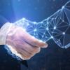 Illustration of a human hand shaking a digitally generated hand.