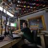 A student in the Radio 1190 studio