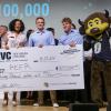 The Refr team poses with Chip, the Buffaloes mascot, and an oversize winning check on a stage.