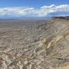 The Bookcliffs line the northern boundary of the Grand Valley, in western Colorado. The high desert region relies on irrigation to enable agriculture.