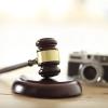 photo of judge's gavel and camera by Sangeun Shin