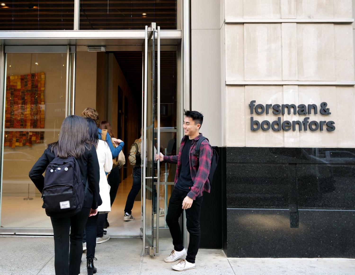Students walking into ad agency in New York City. 