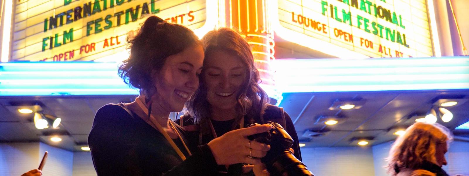 Students looking at camera at the Boulder International Film Festival in 2020.
