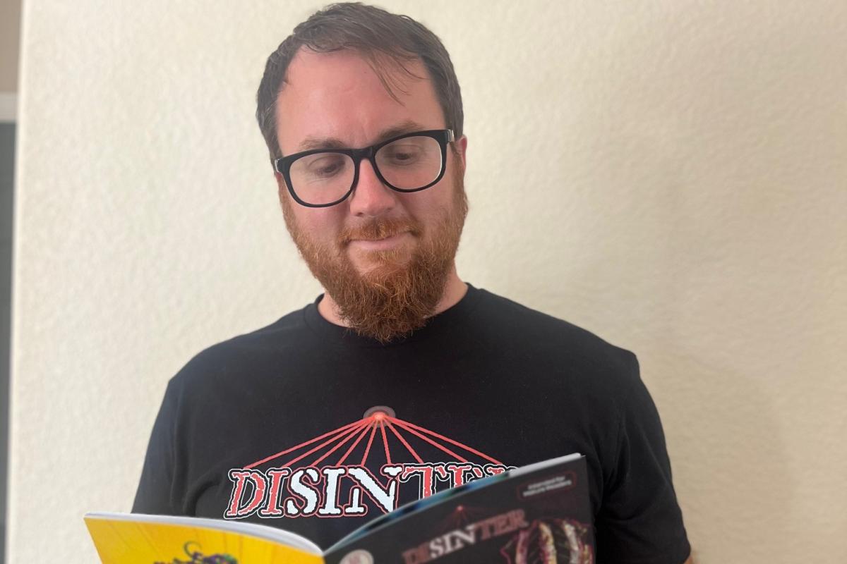 Joel reading his comic
