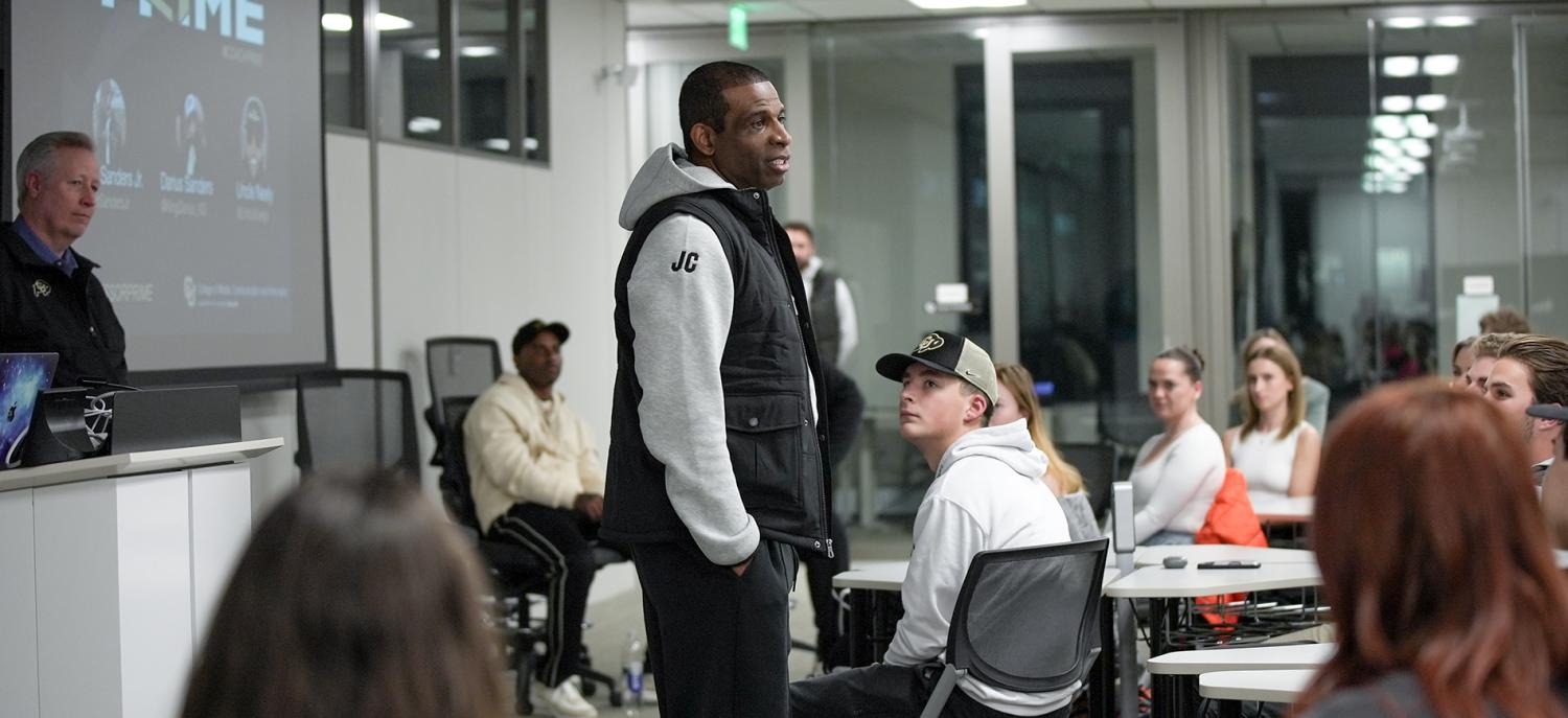 Professor Prime leading the class in discussion.