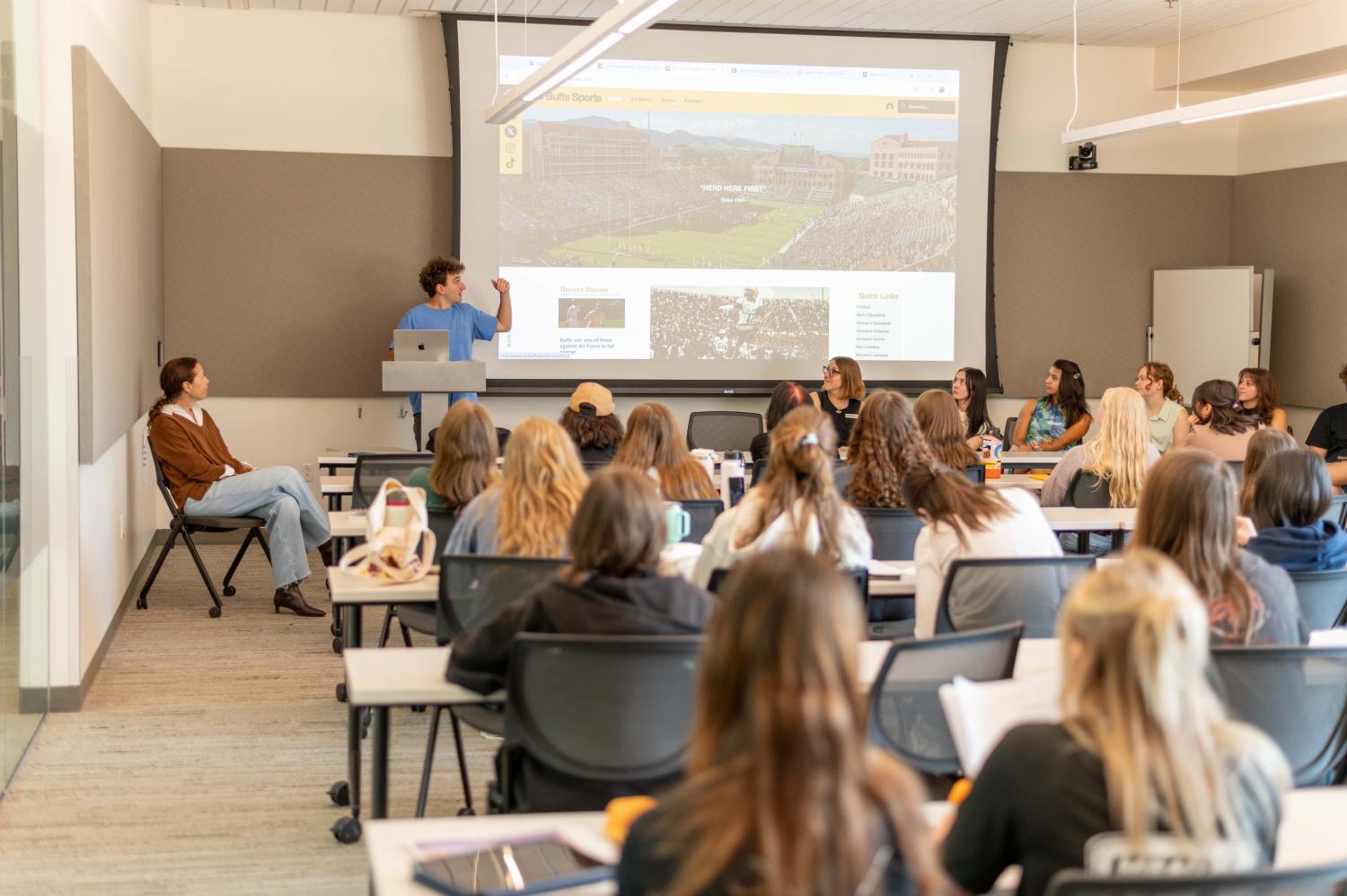 Students attend a presentation at J-Day