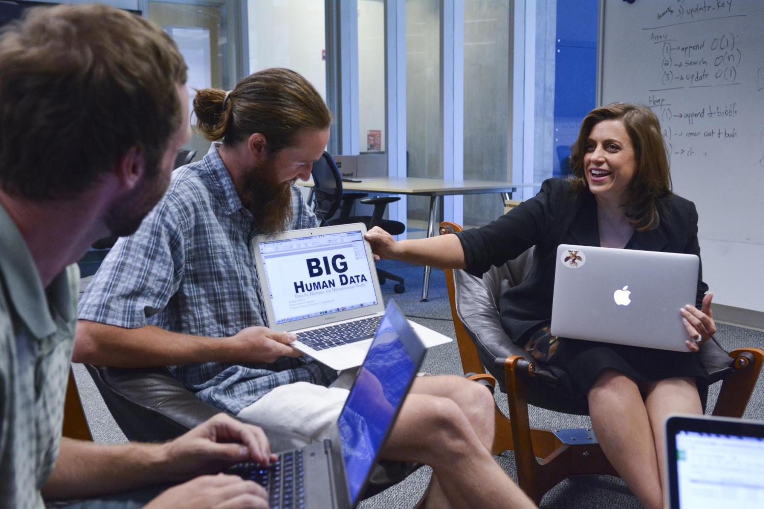 Leysia works with students