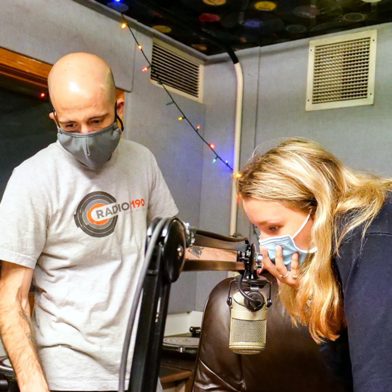 Belleville High School junior Kendall Stark prepares to speak live on Radio 1190 with the help of CMCI Instructor and Radio 1190 General Manager Jared Browsh.