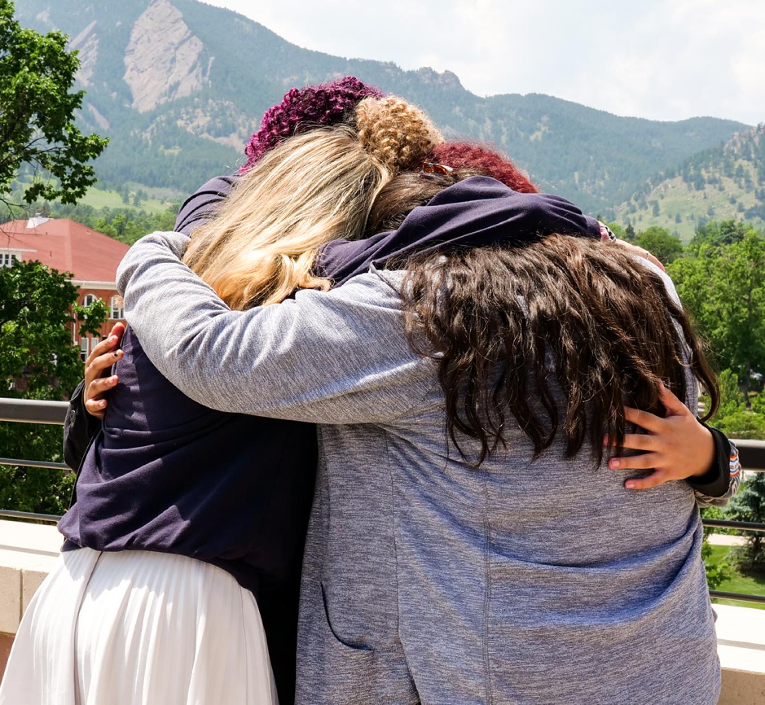Connections participants exchange goodbye hugs as the program comes to a close.
