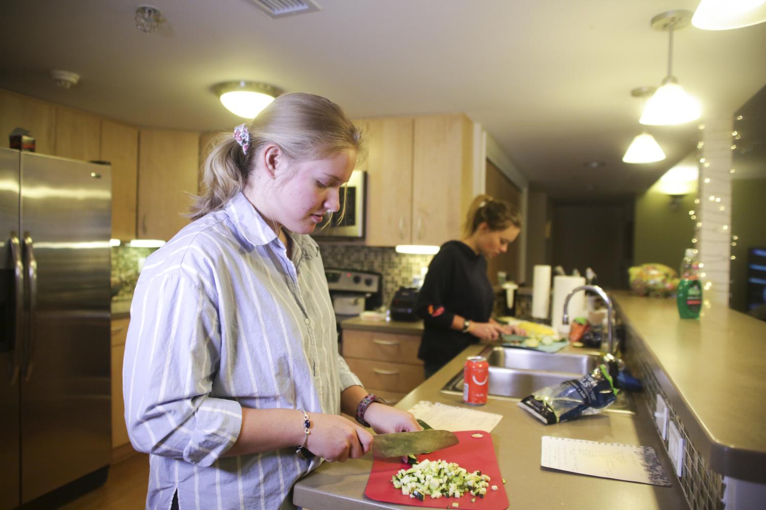 Students prepare food.