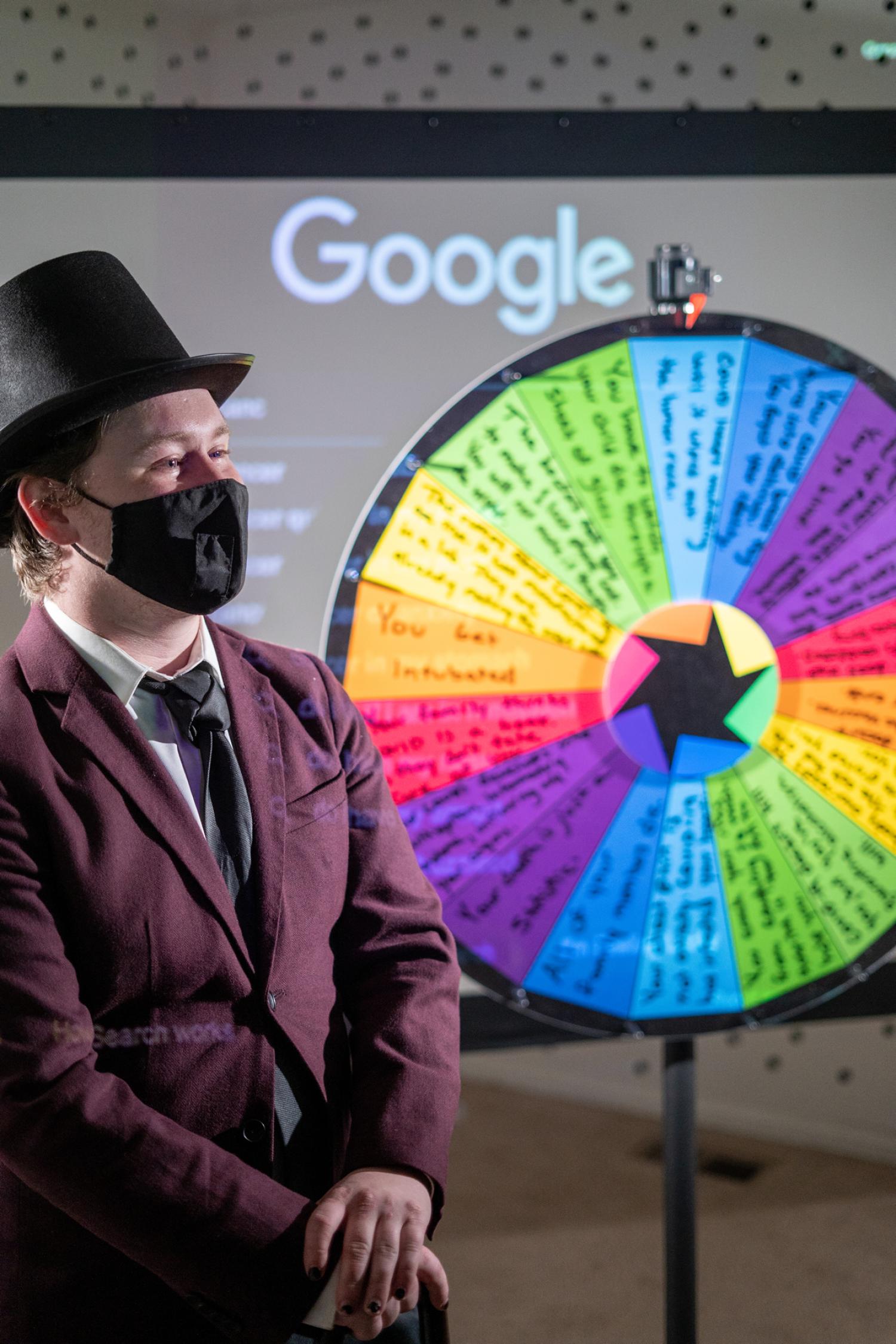 Next is the Cyberchondria room, where guests spin the Wheel of Fate, guided by a host played by Passios' roommate. As visitors spin the wheel to land on one of its worst-case scenarios, a video of various symptom-based Google searches projects in the background.