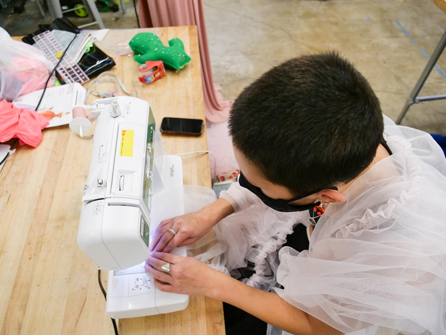Student sewing their clothes
