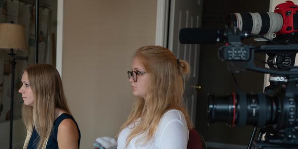 Ashley Hopko and Alexis Egeland conduct an interview. Photo by Justin Parham.