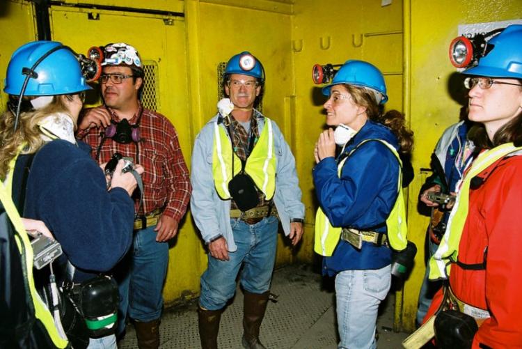 Fellows in an elevator