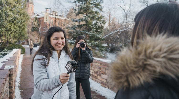 Tayler Shaw and Lauren Irwin conduct an interview. Photo by Andrew Patra.