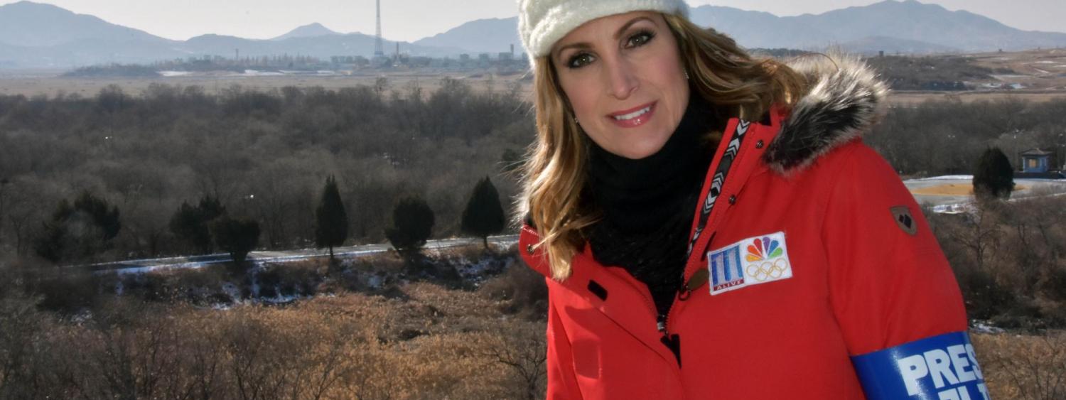 Preheim stands near the Demilitarized Zone, where she learned about the history of North and South Korea from soldiers stationed in the area.