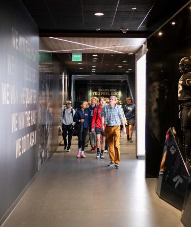 Students tour Folsom stadium.