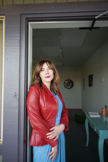 Rory poses at her art gallery