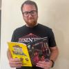 Joel reading his comic