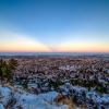 The sun sets on Boulder during the evening of Sunday, Jan. 2, 2022, the day after 8.2 inches of snow fell across the county and helped stem the rapid spread of the Marshall Fire.
