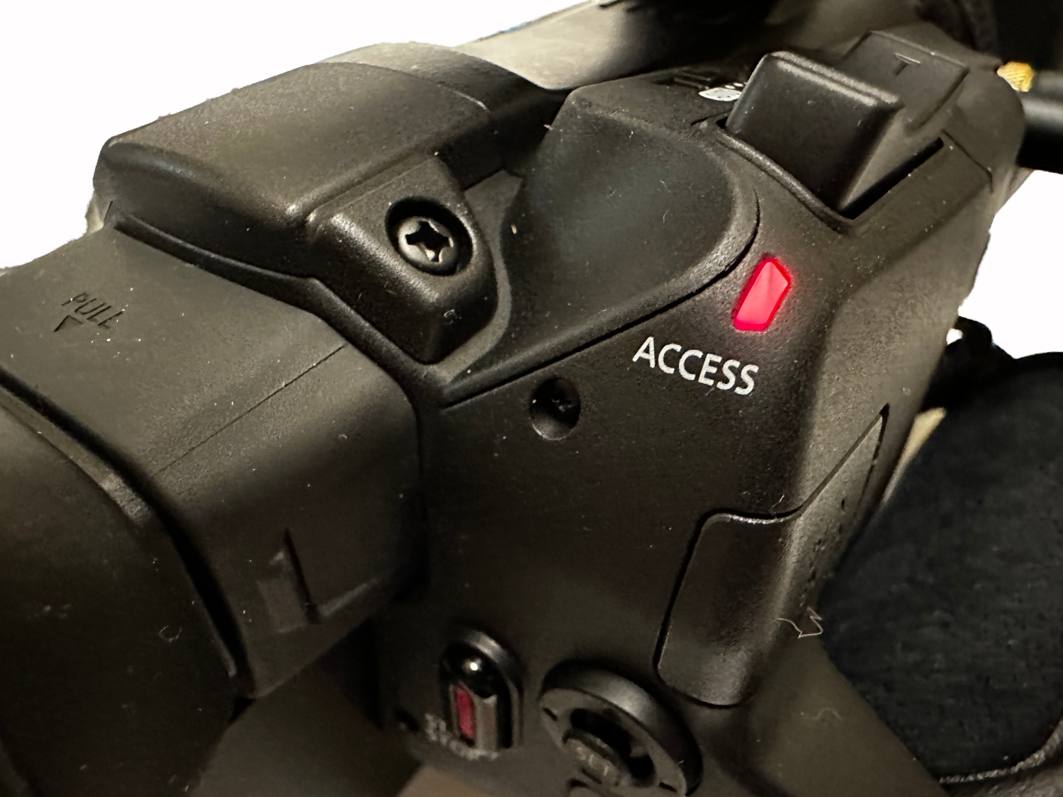 Access light on the camera being red, indicating that the sd card shouldn't be removed