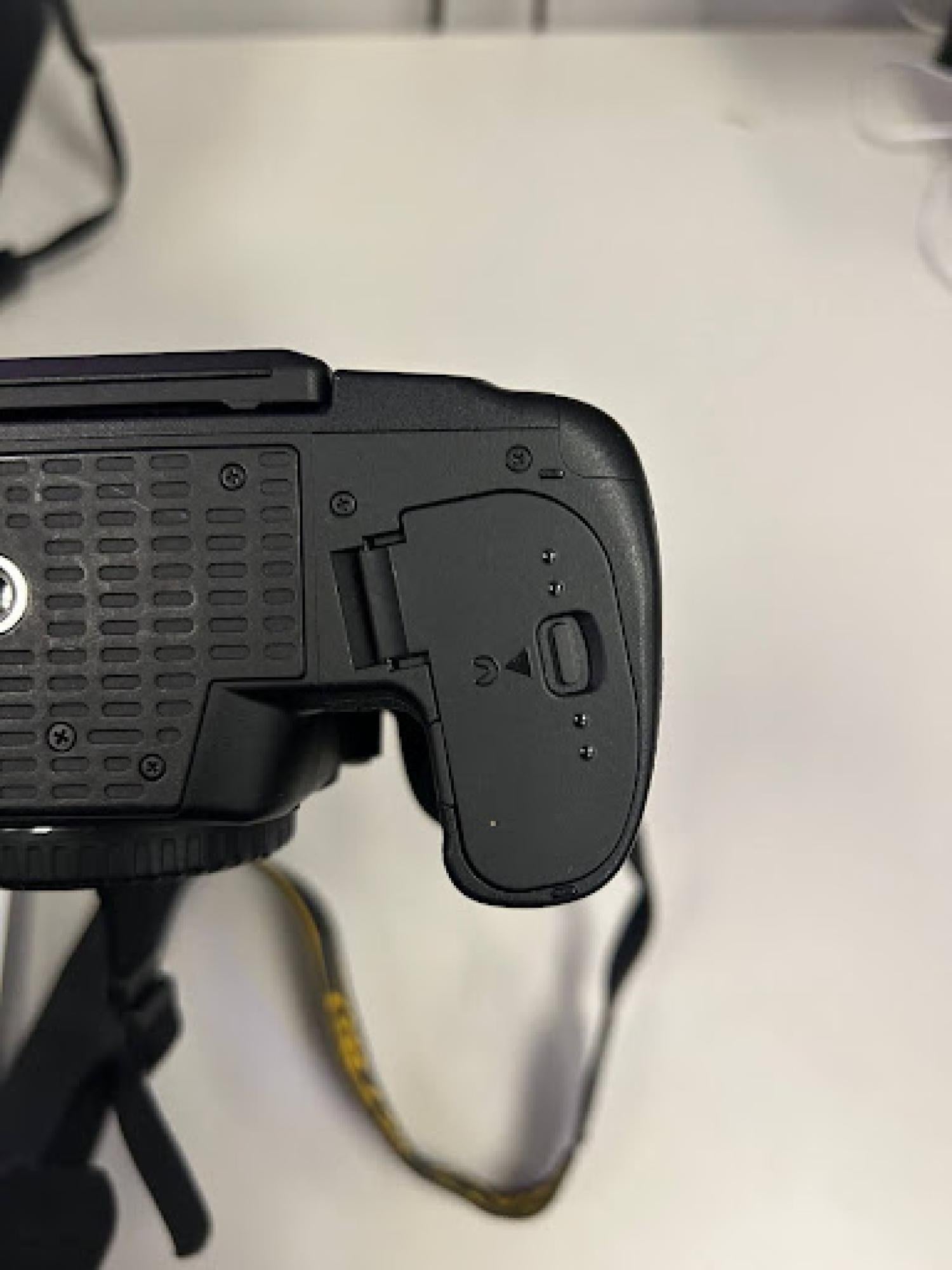 Battery compartment latch closed