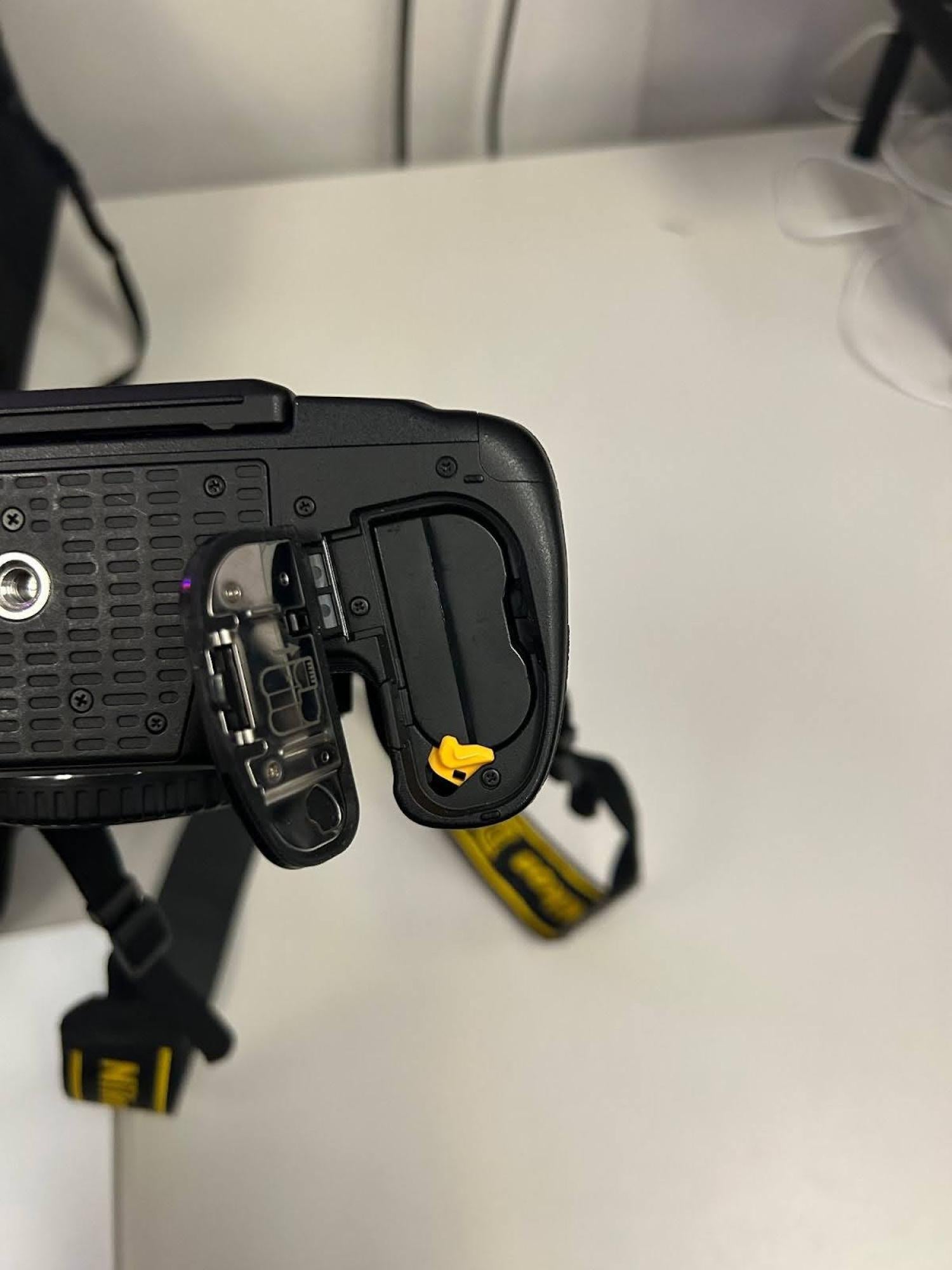 Battery compartment with battery inserted