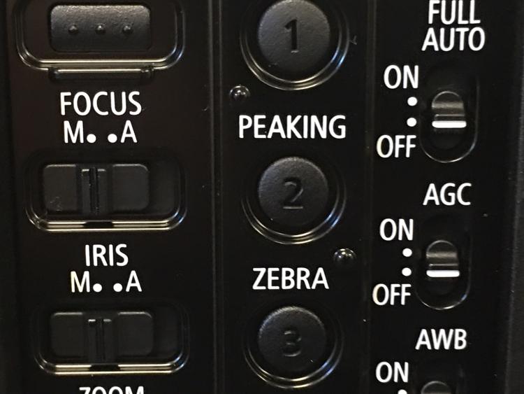 Peaking button