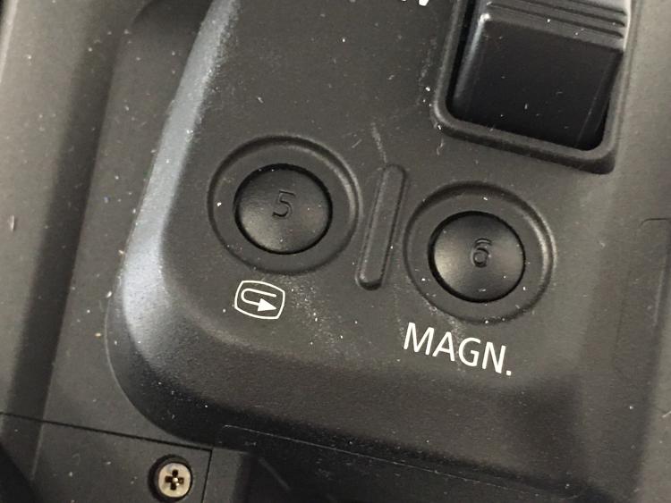 Magnification button