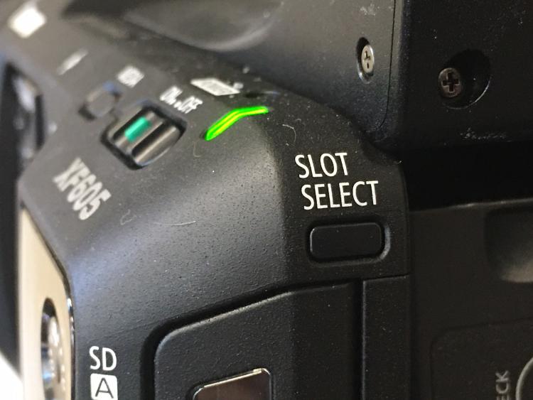 Slot select button