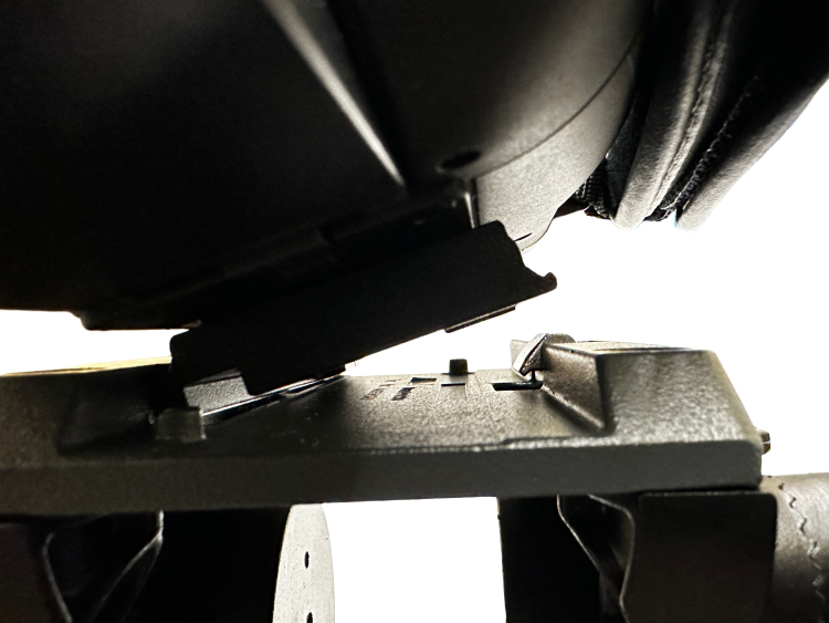 Showing how to put the camera with tripod plate attached onto the top of the tripod