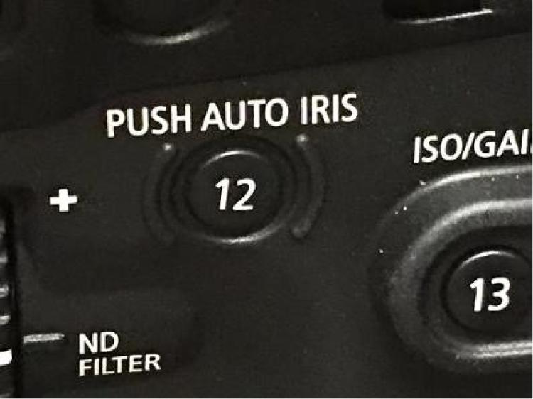 Auto iris button