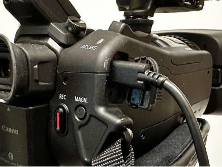 Power cord plugged into camera