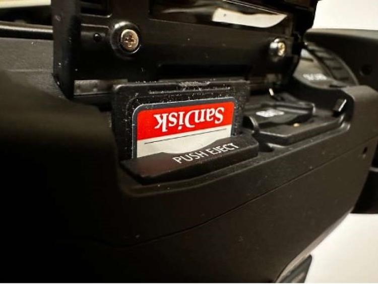 SD card inserting into camera