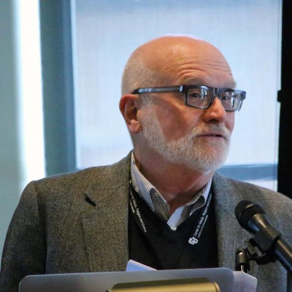 Stewart Hoover delivers the introduction to a session