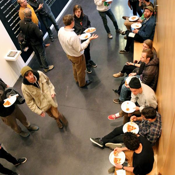 Students gather for refreshments before the announcements