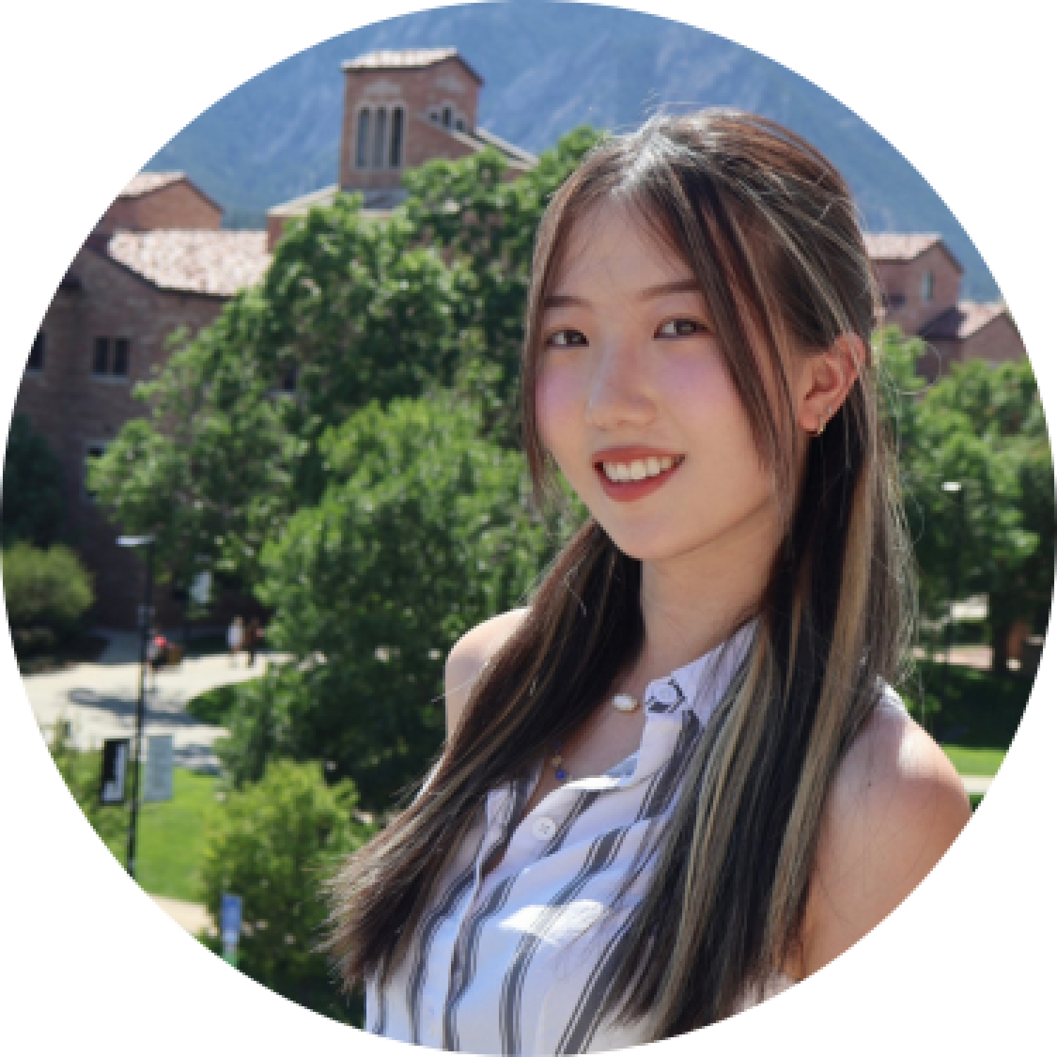 Image of person in front of CU campus
