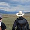 students gazing at a grassy field
