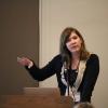 A presenter addresses the conference audience.