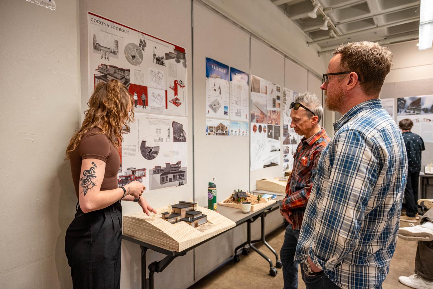 A student receives feedback during a guest critique.