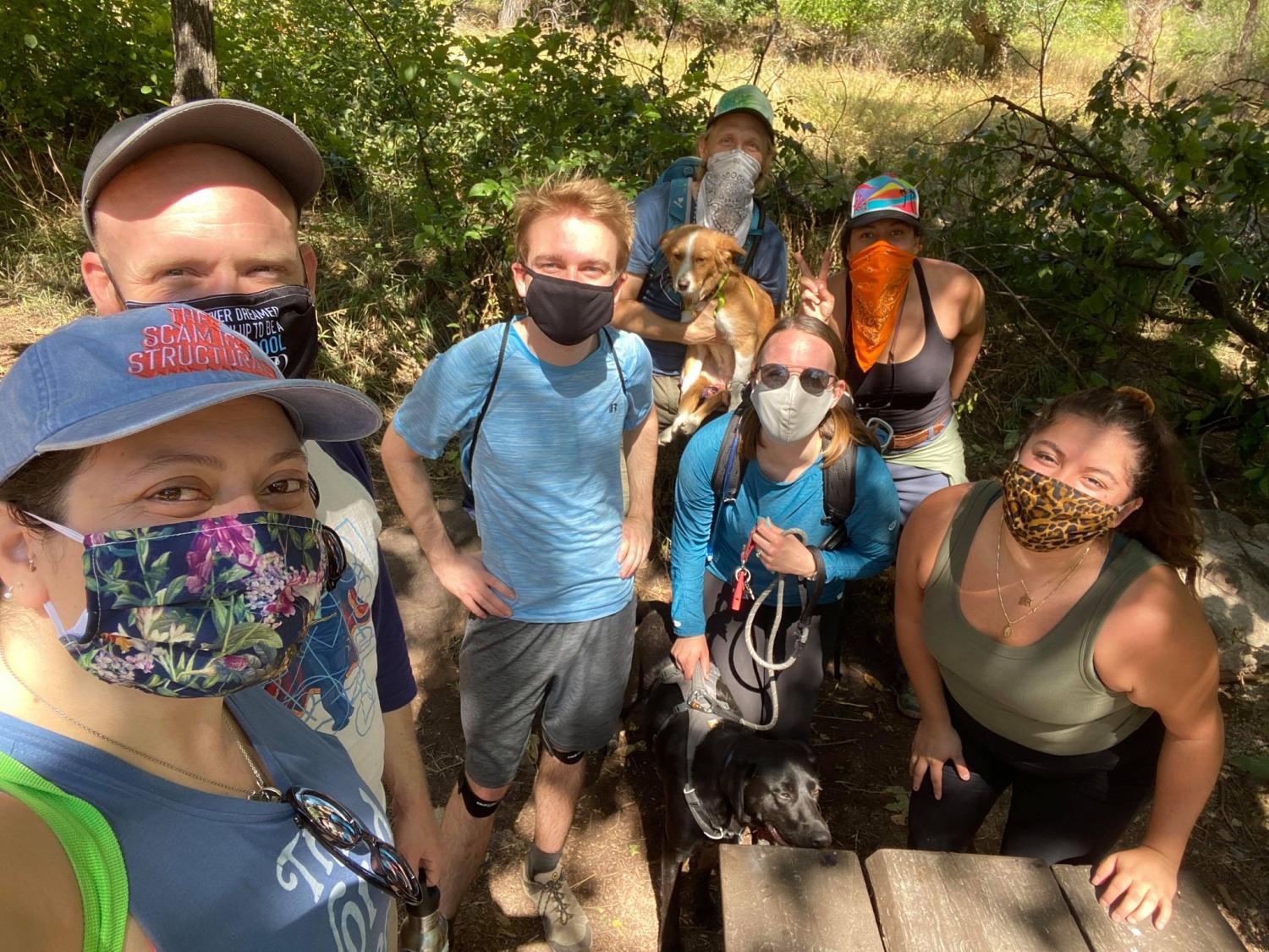 Students go hiking while wearing masks