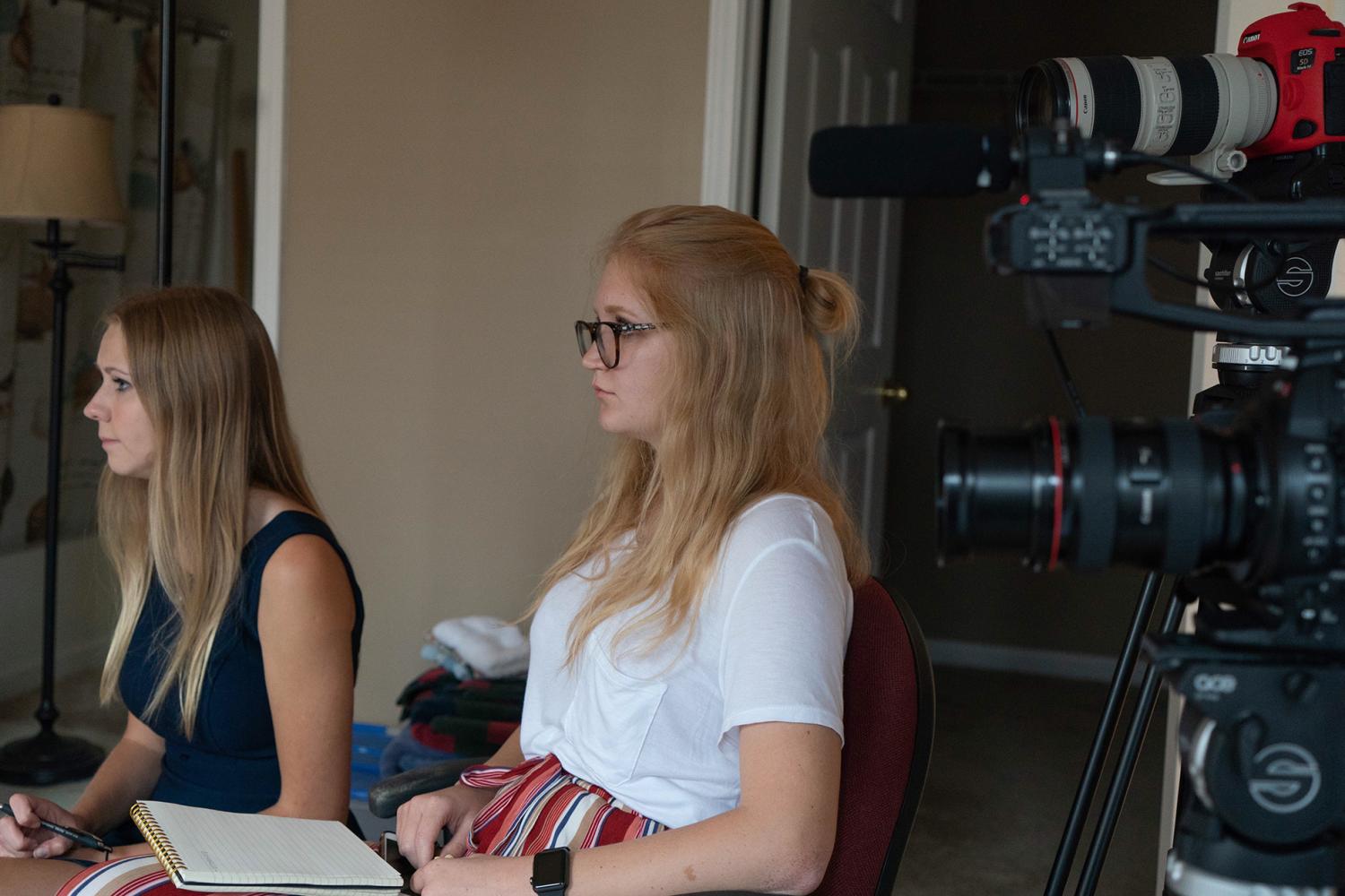 Ashley Hopko and Alexis Egeland conduct an interview. Photo by Justin Parham.