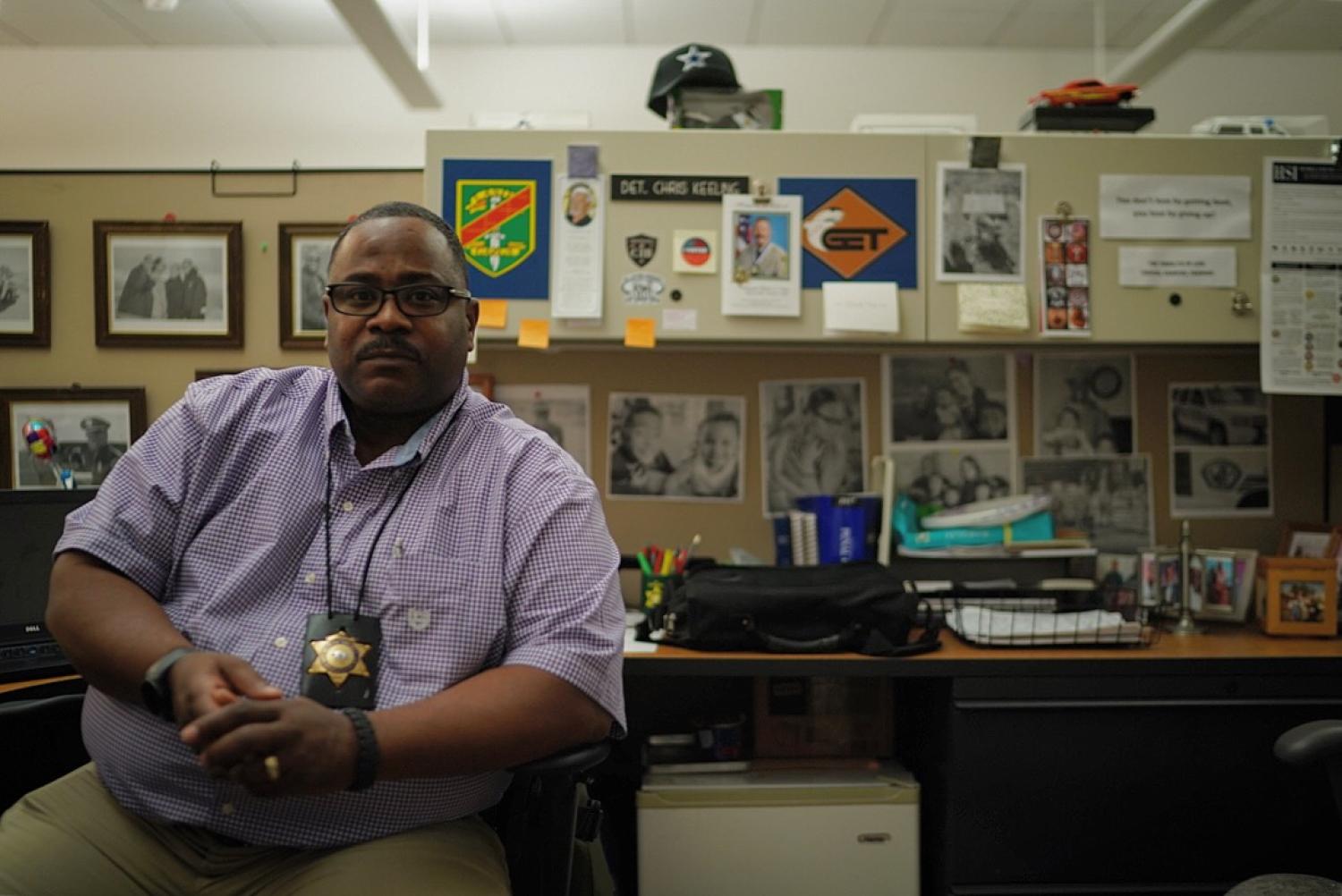 Los Angeles County Sheriff’s Department Hate Crime Coordinator Christopher Keeling speaks with fellows at his office. Photo by News21 fellow Angel Mendoza.