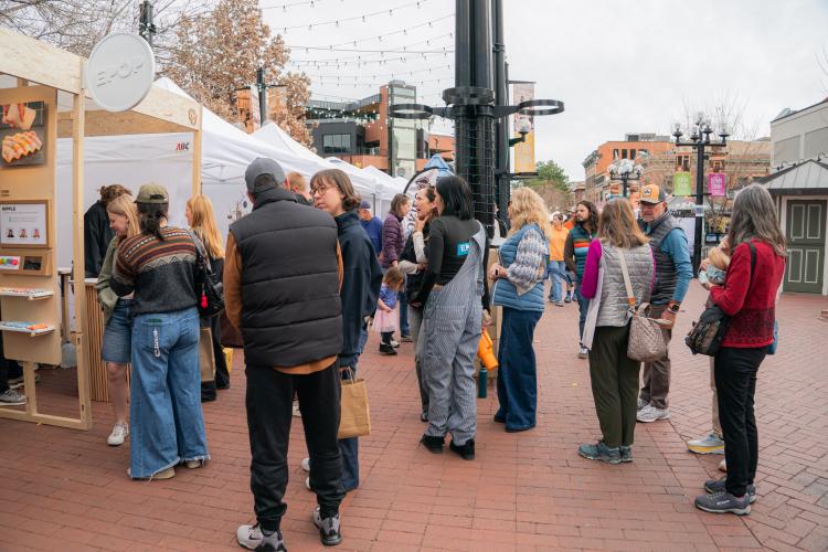 People in line to purchase items from the EPOP Shop