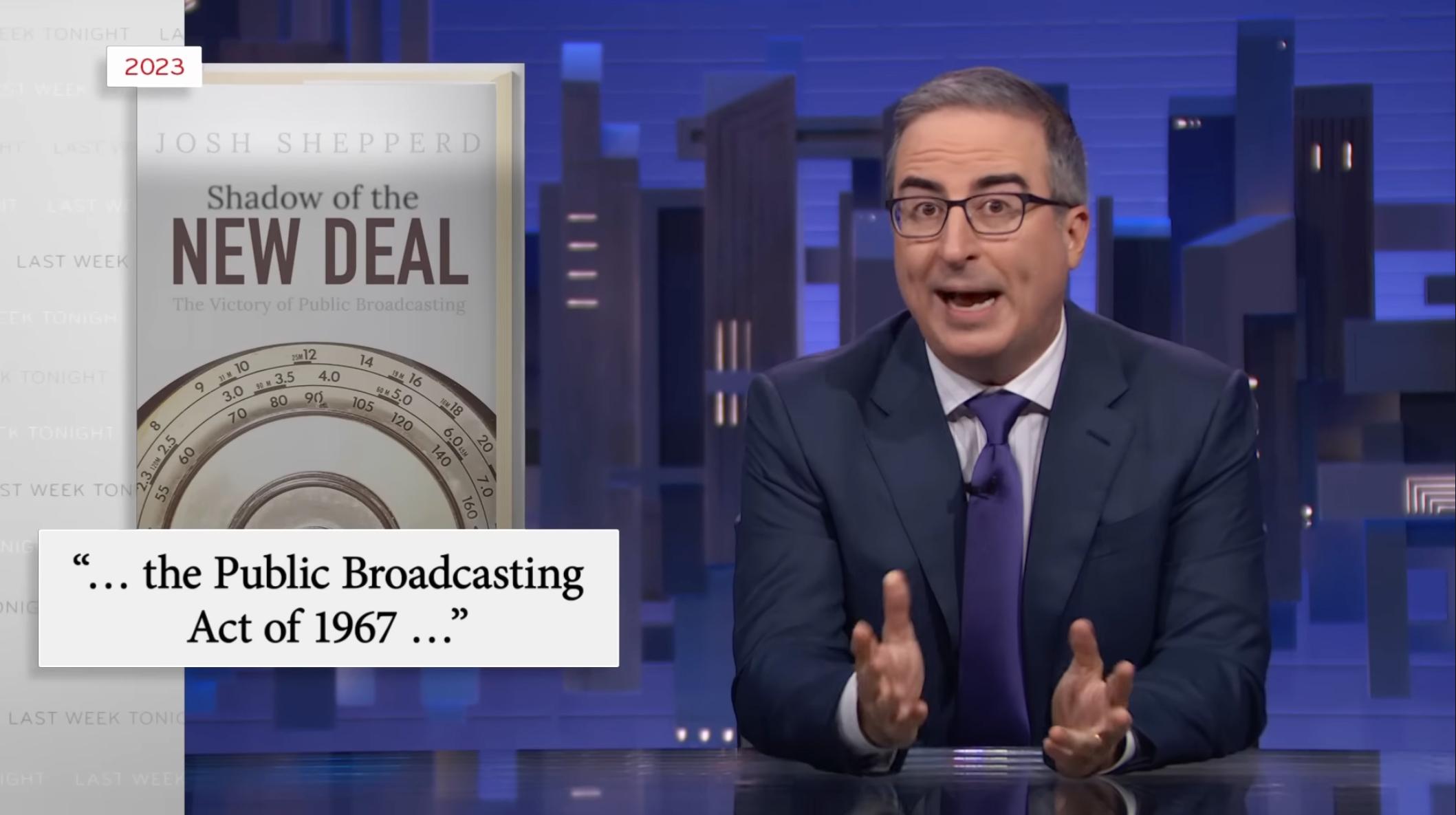 A screen capture of John Oliver with the cover of a textbook as the graphic.