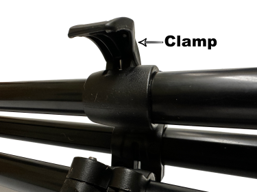 Unlatching the tripod clamp
